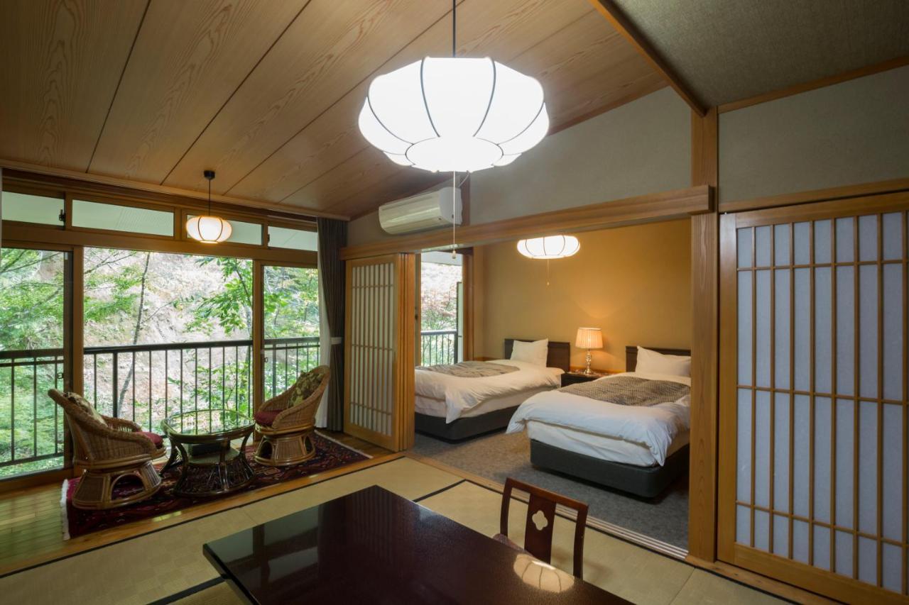 Kurokawa Onsen Oku No Yu Hotell Minamioguni Exteriör bild