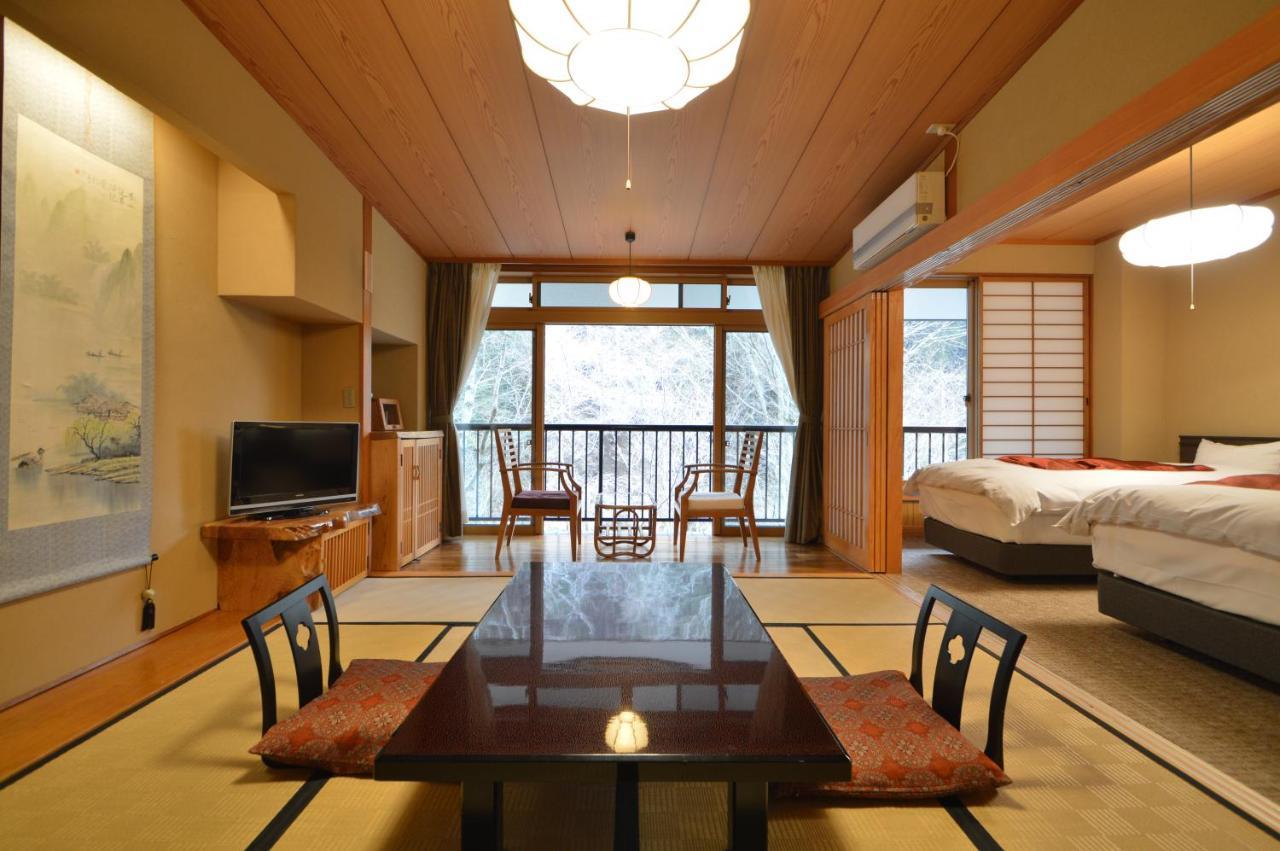 Kurokawa Onsen Oku No Yu Hotell Minamioguni Exteriör bild